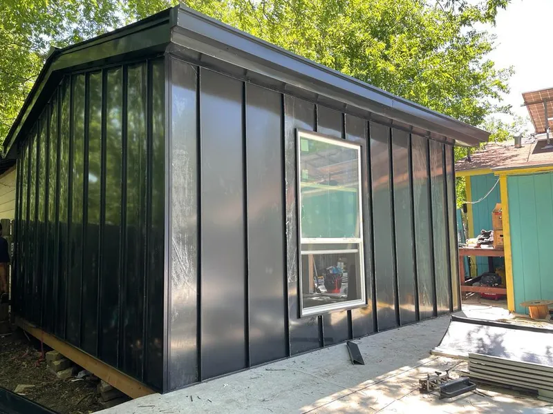 Black standing seam metal wall panels for Metal Roof Installation in Holly Ridge