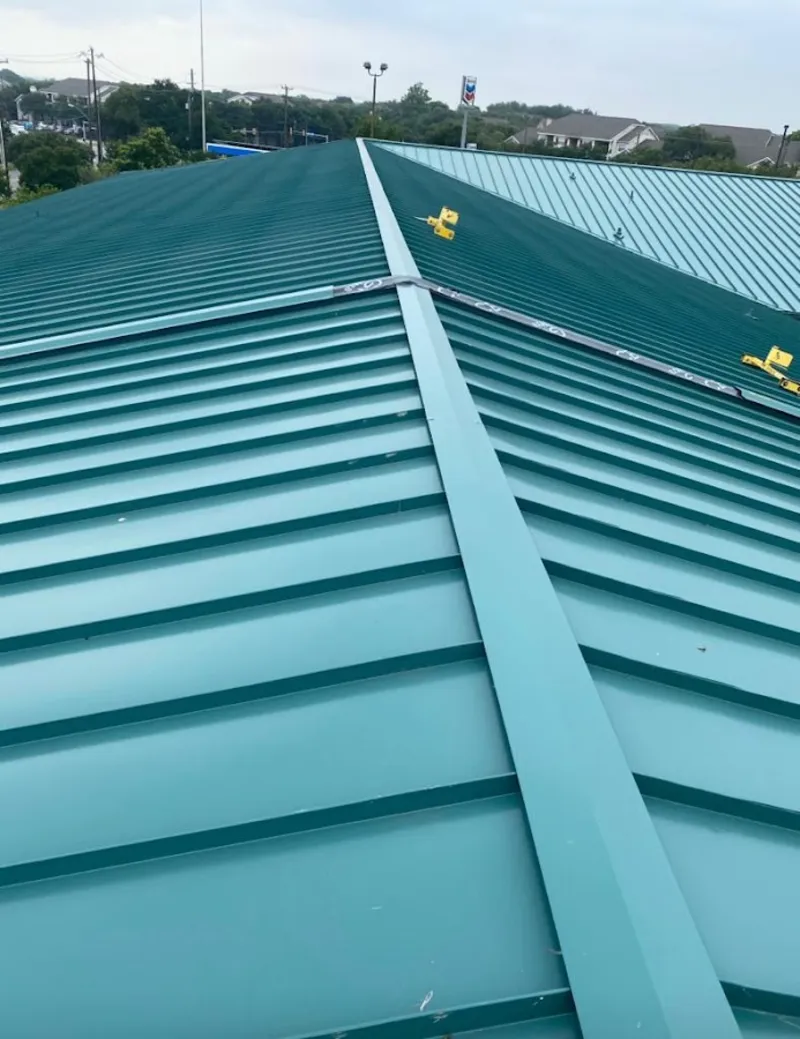 Green commercial metal roof ridge and valley for Metal Roof Repair in Holly Ridge